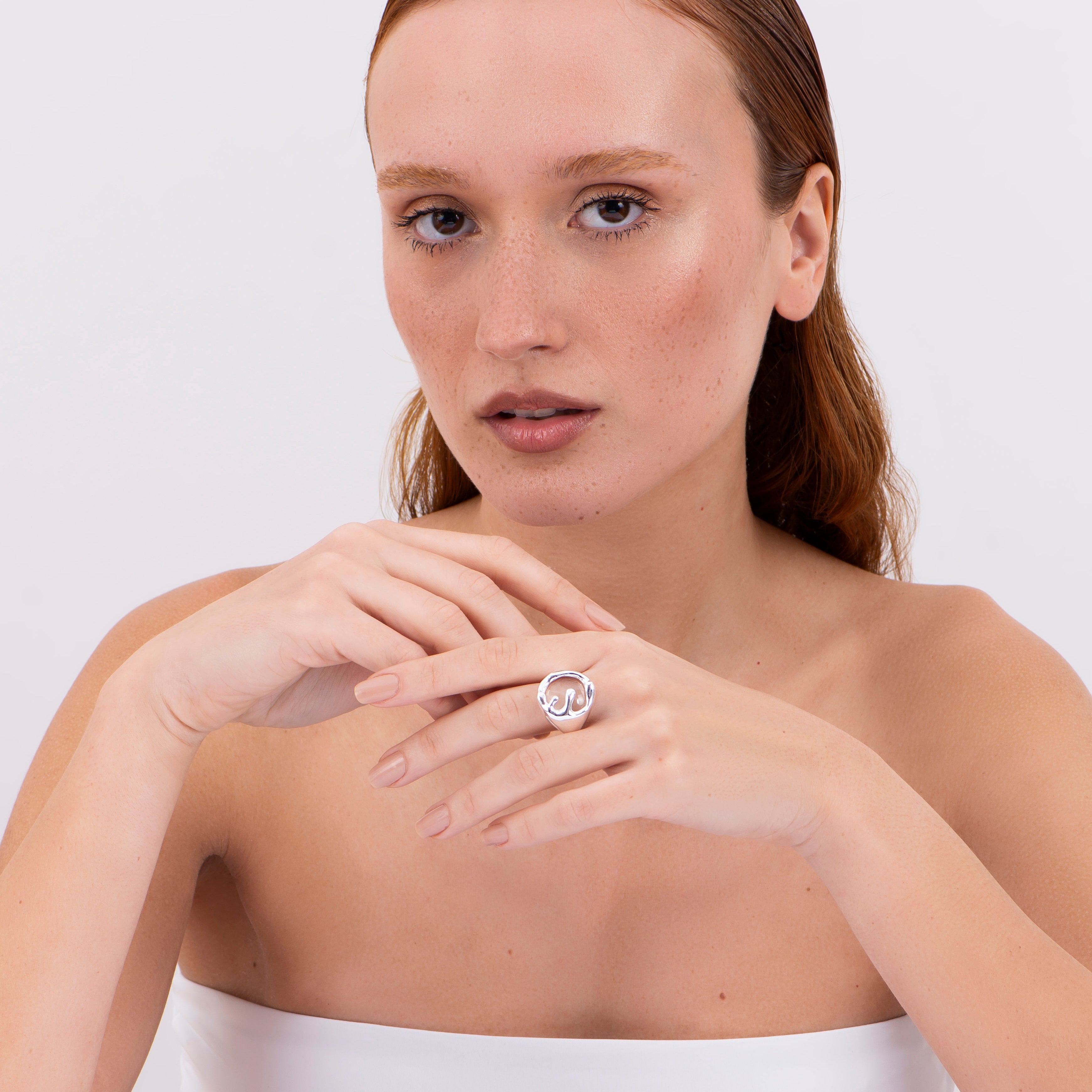 minimalist silver ring worn on hand elegant style