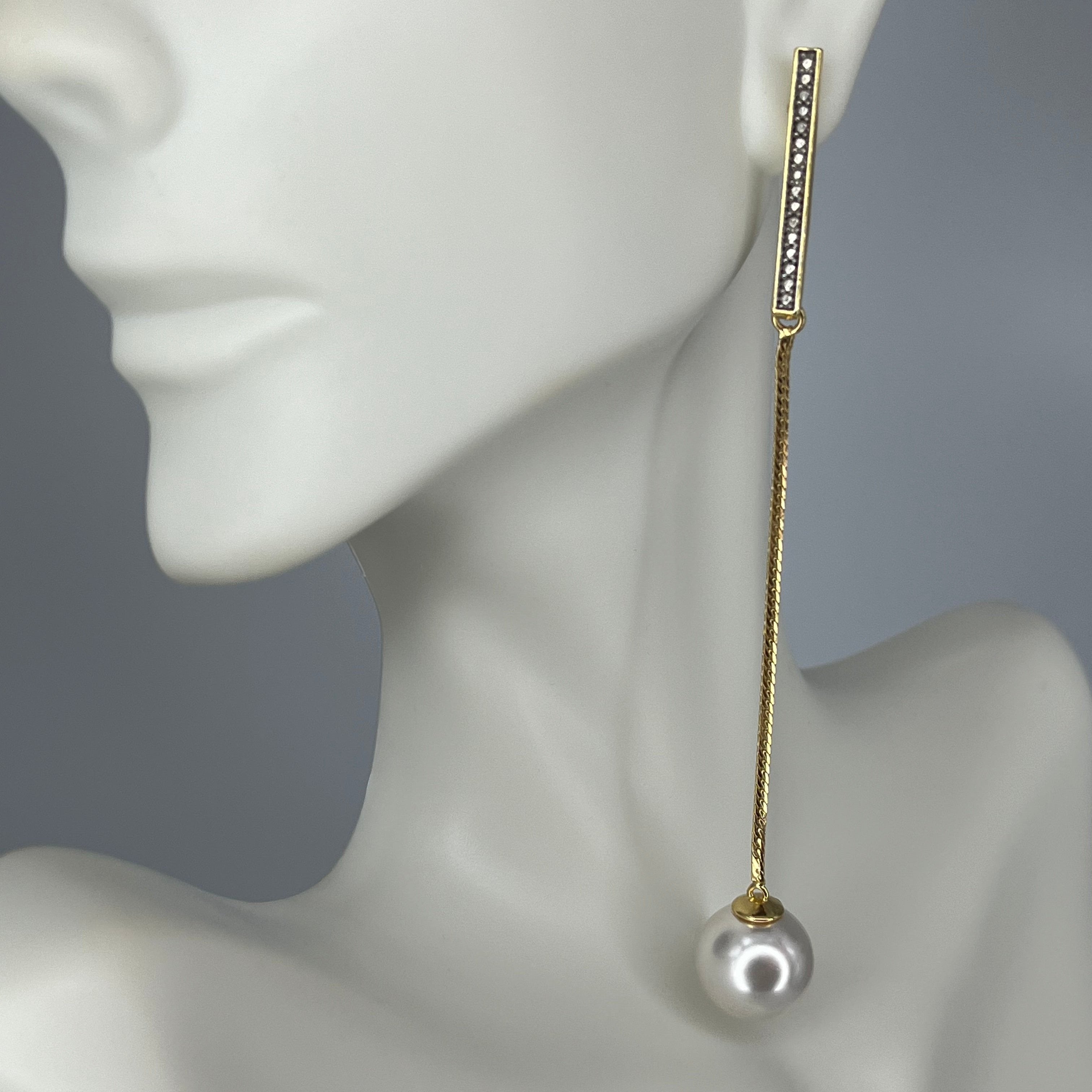 EARRING WITH A PEARL PENDANT