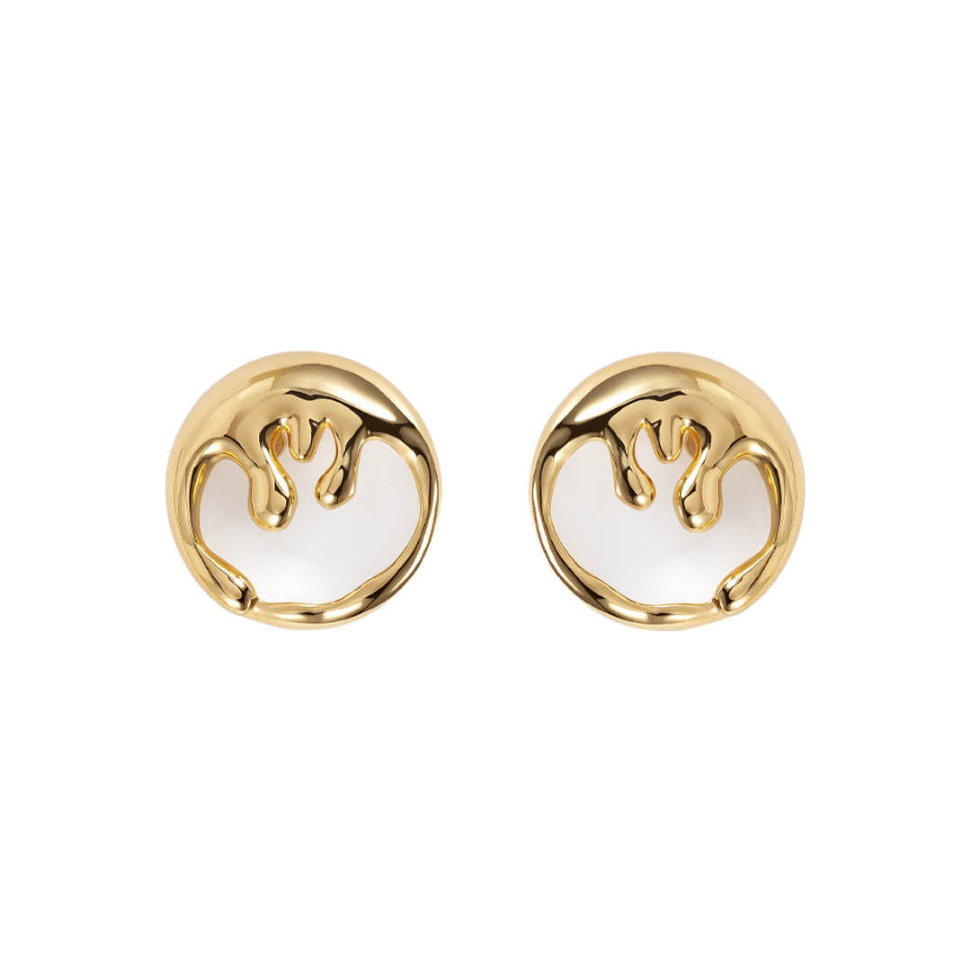 Modern organic gold earrings with fluid sculptural design